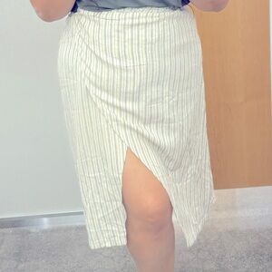 Very cute boho style + versatile linen blend midi shirt.